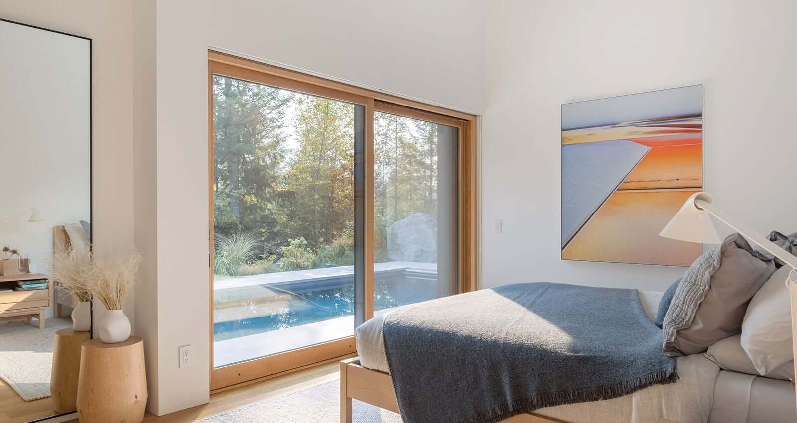 large sliding glass door with wood frame